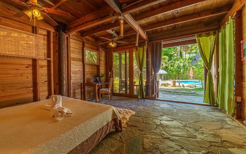 Eco Deluxe Room at Cabarete Maravilla Ecolodge — queen bed with garden and ocean view, Cabarete Dominican Republic